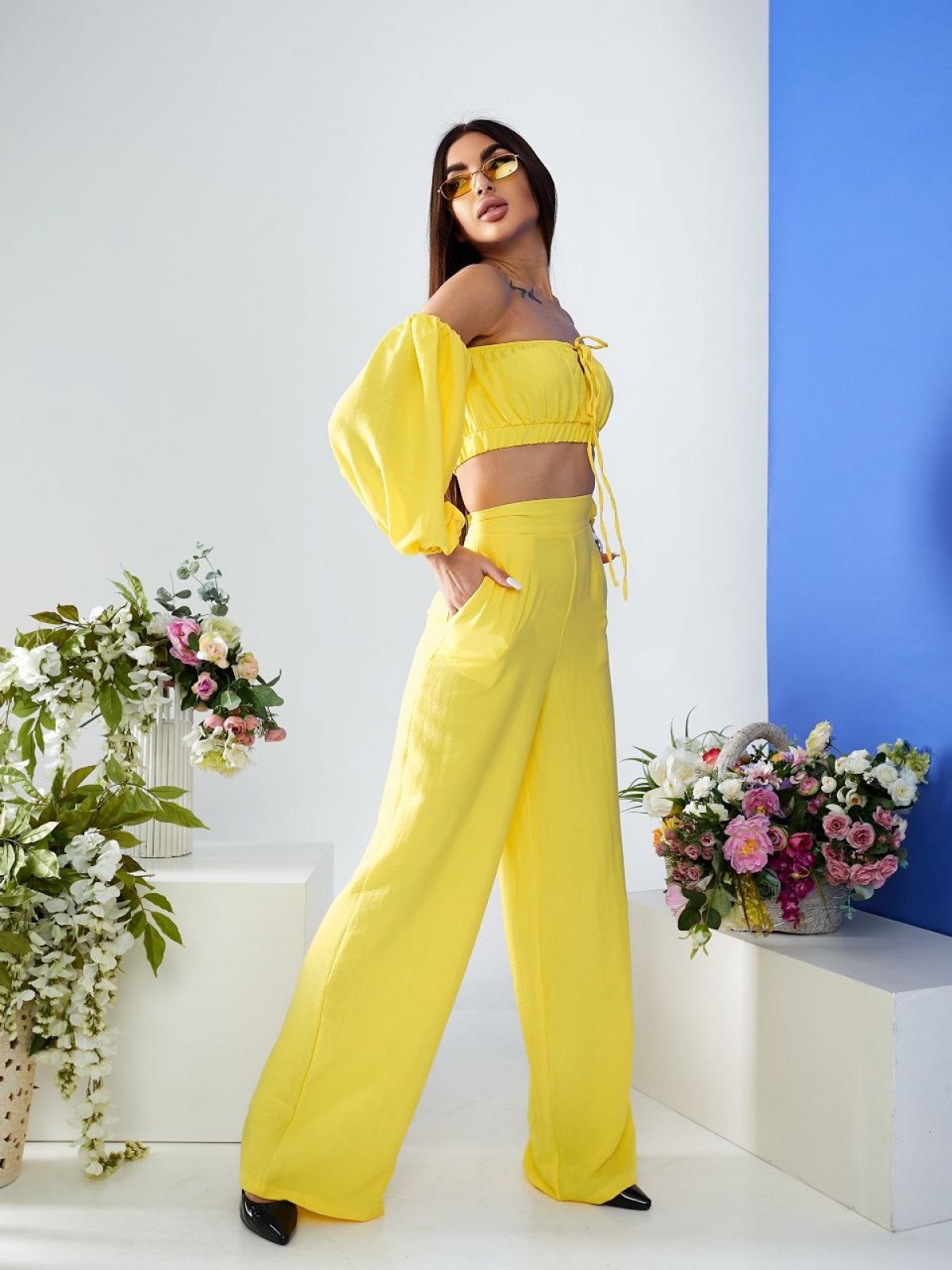 Жіночий  костюм топ і штани палаццо жовтого кольору р.XS 387271
